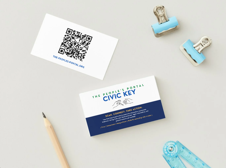 Civic Key front and QR-code cards arranged on a community workspace.
